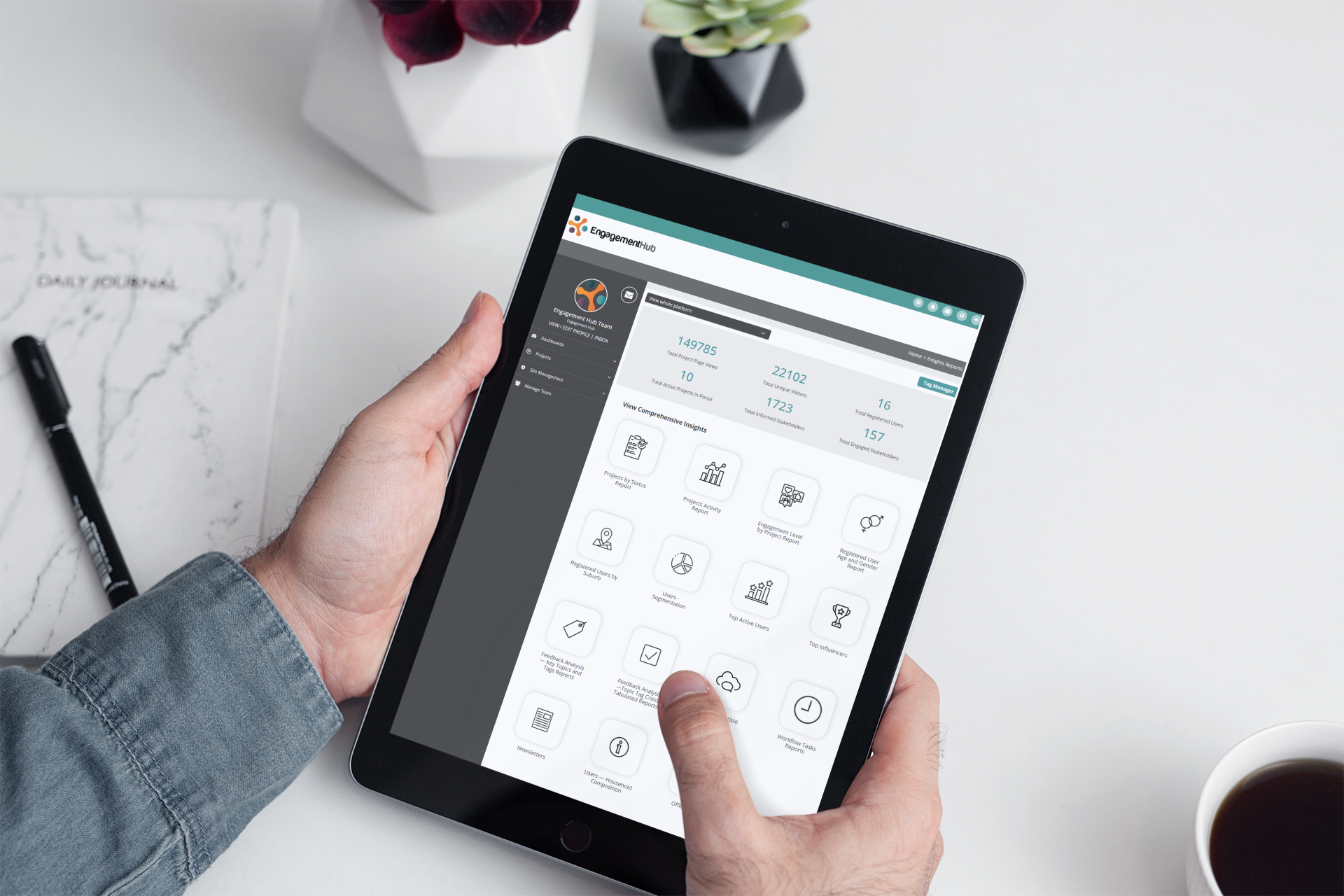 mockup-of-a-pair-of-hands-holding-an-ipad-in-a-minimalistic-scenario-2167-el1